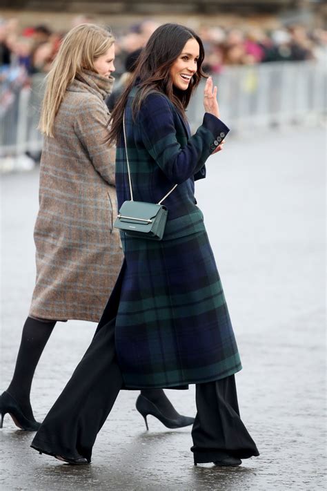 Meghan Markle wears a very fitting Burberry tartan coat for her 